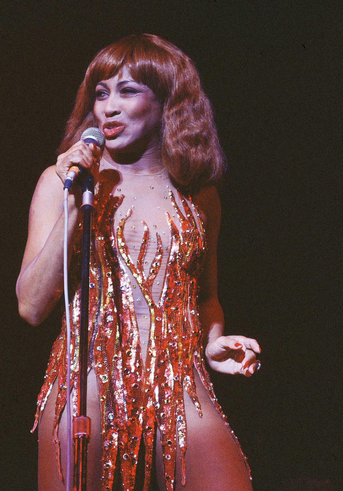 Photo of Tina Turner performing live on stage c.1979, solo era